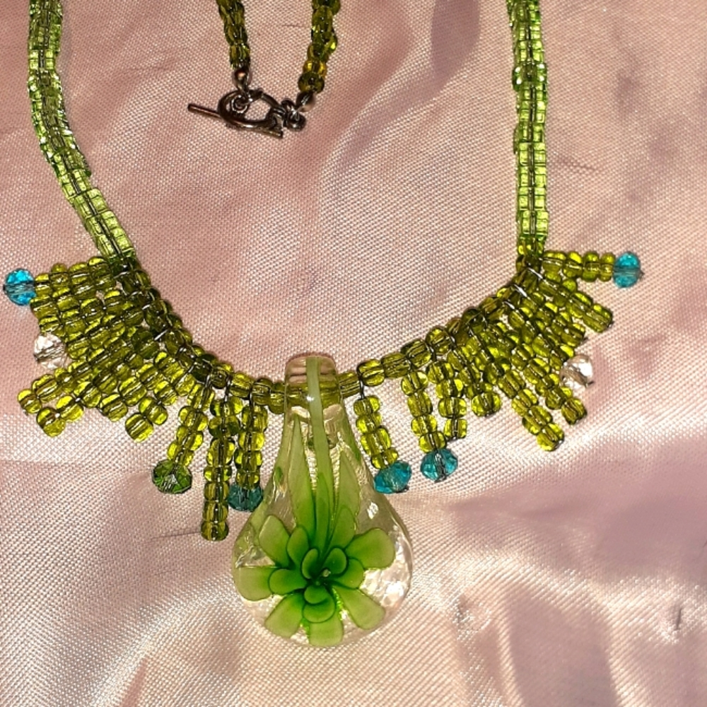 Lampwork green flower pendant, glass seed necklace